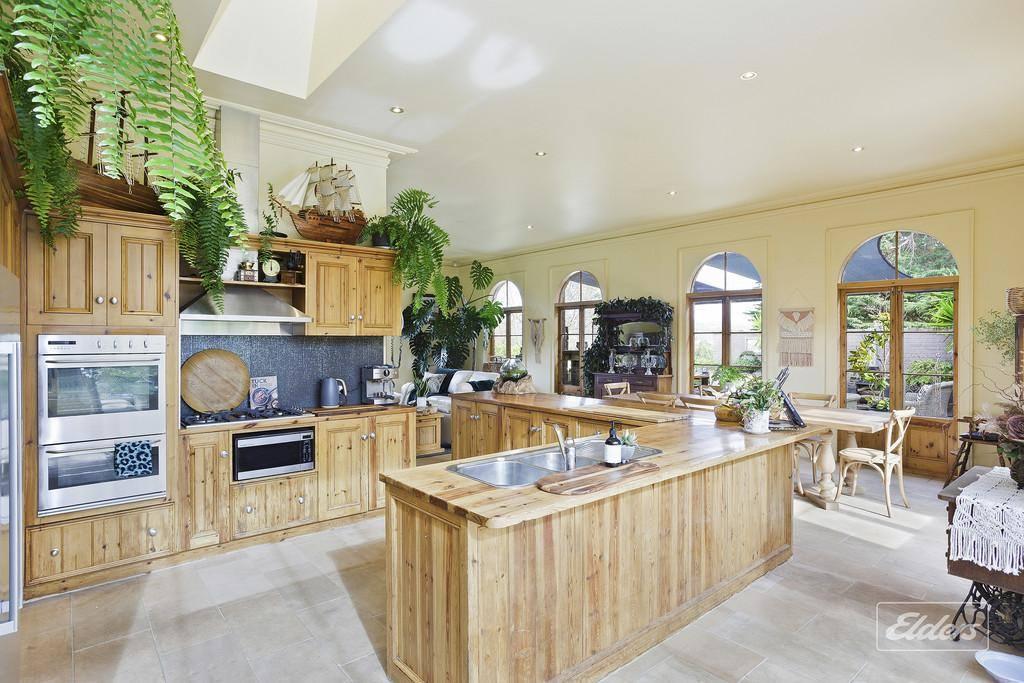 This rural property for sale Tasmania  boasts a spacious kitchen and the choice of two dining areas