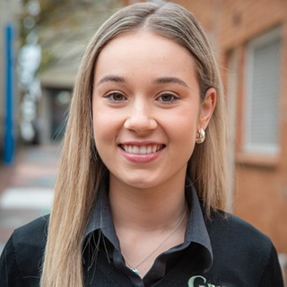 Torie Coomber - Groves Real Estate