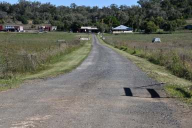 Farm Sold - QLD - Aubigny - 4401 - 'Rawbell' 
Superbly positioned, for a variety of uses, with a Irrigation license and classic Queenslander home.  (Image 2)