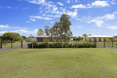 Farm Sold - QLD - Branyan - 4670 - In a serene upscale street, this spacious property offers modern interiors and expansion potential.  (Image 2)